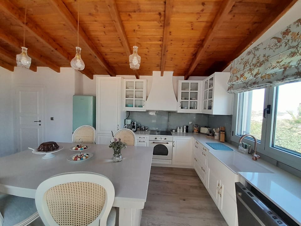 Fully equipped kitchen with everything needed for home-style cooking.