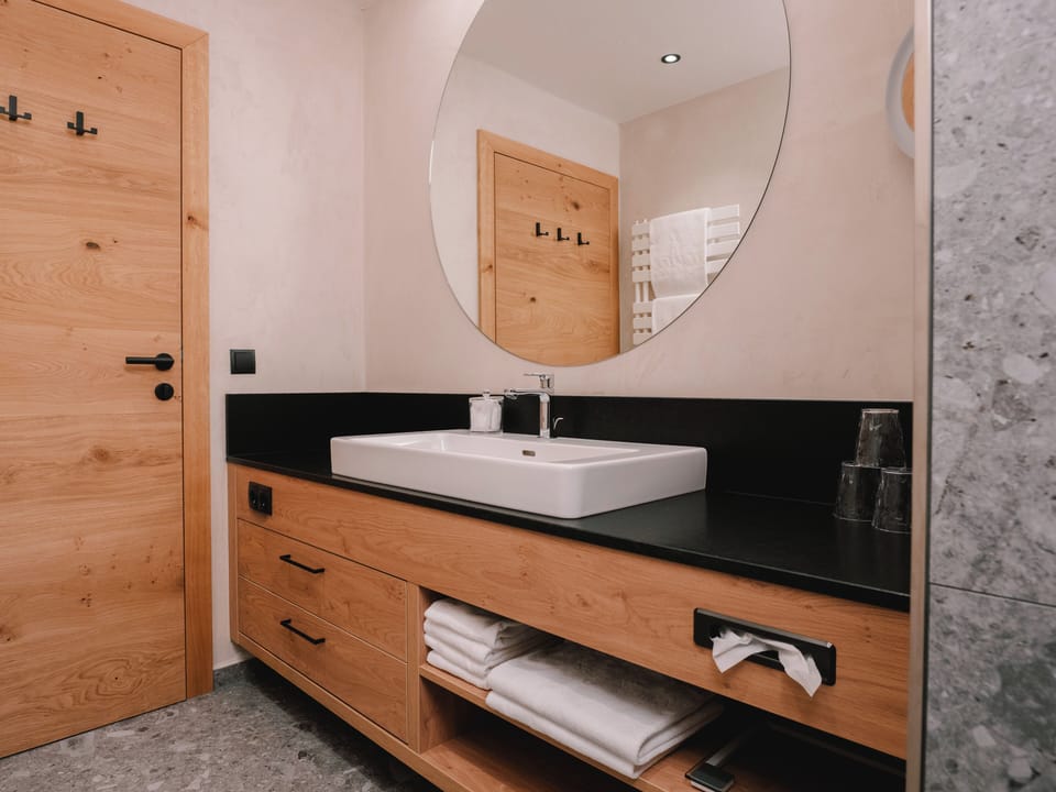 Separate tub and shower, free toiletries, hair dryer, bathrobes