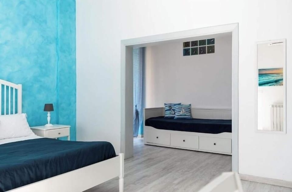 Family Quadruple Room, Balcony | Blackout drapes, soundproofing, iron/ironing board, free WiFi