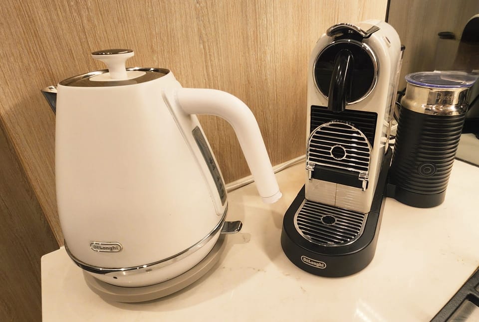 Delonghi Nespresso, kettle, toaster, hotel tea coffee tray inc UHT milk x 1