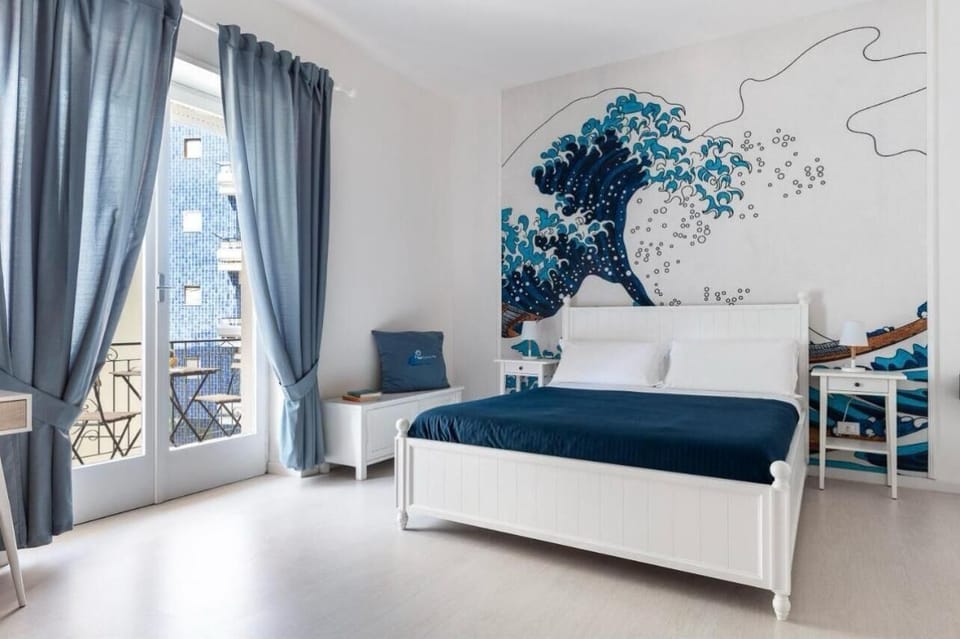 Comfort Quadruple Room, Balcony | In-room safe, soundproofing, iron/ironing board, free WiFi