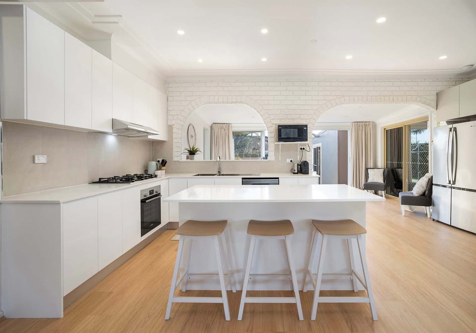 Coastal Palms  |  Recently Renovated Modern Kitchen with Fridge, Freezer, Oven, Cooktop, Dishwasher, Microwave and Coffee Machine 
