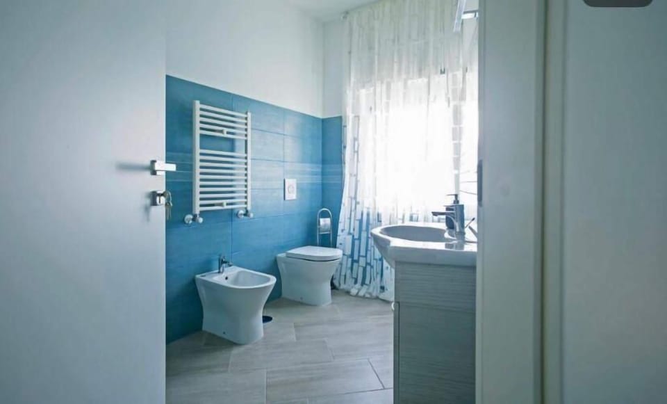 Deluxe Double Room | Bathroom | Bathrobes