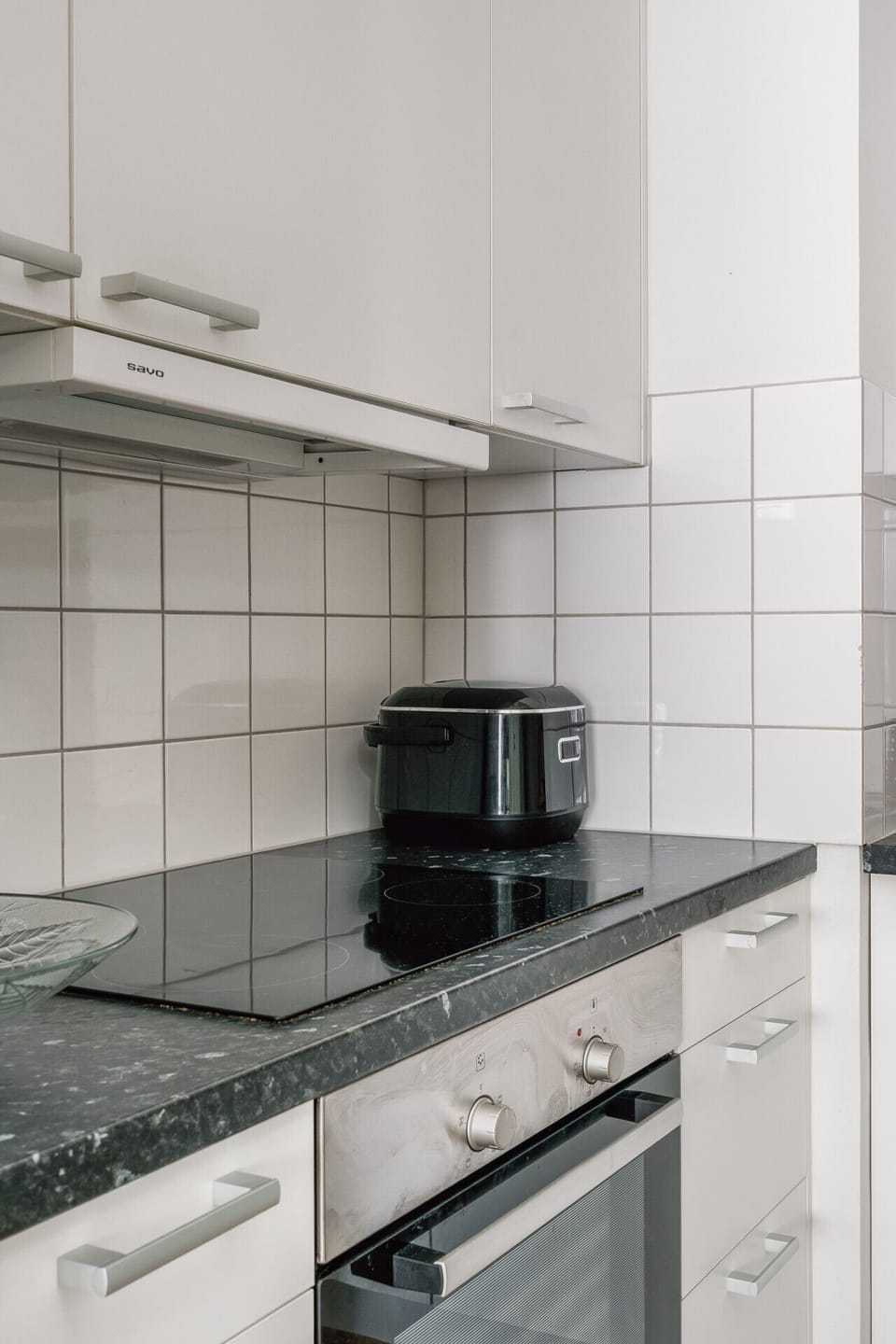 A modern induction stove and oven are ready for your culinary needs during your stay in Helsinki.