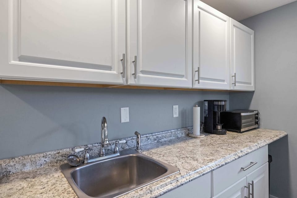 Fully equipped kitchen with modern appliances, ample counter space, and all your cooking essentials.