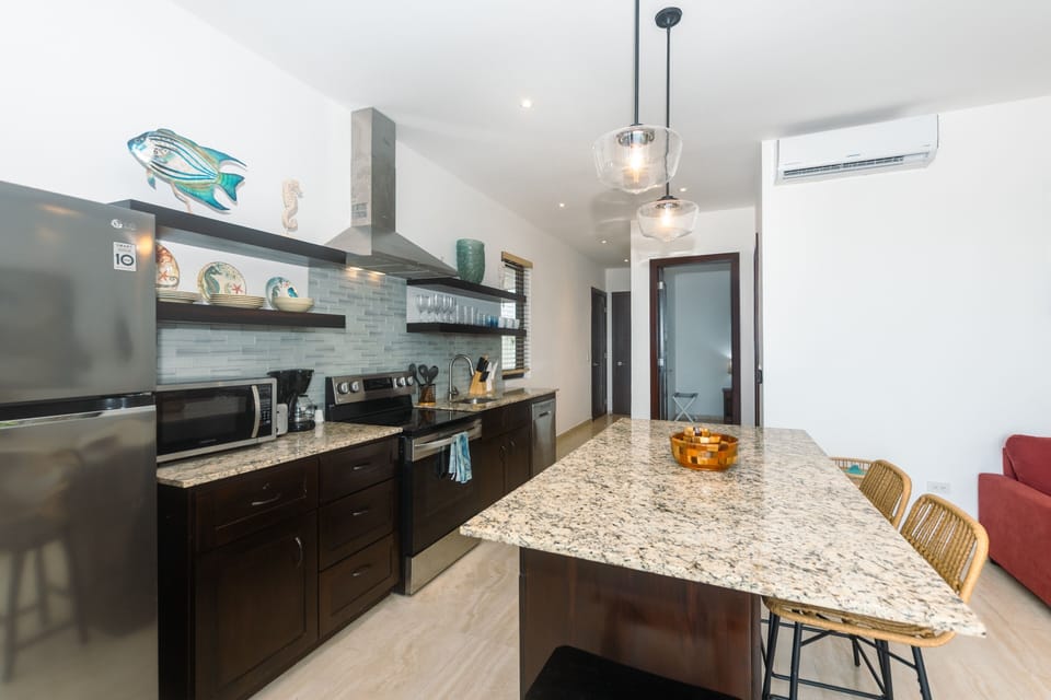 Condo, 2 Bedrooms | Private kitchen | Fridge, oven, coffee/tea maker, toaster