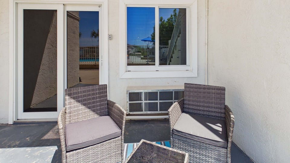 Seating on front patio lets you walk right onto the beach