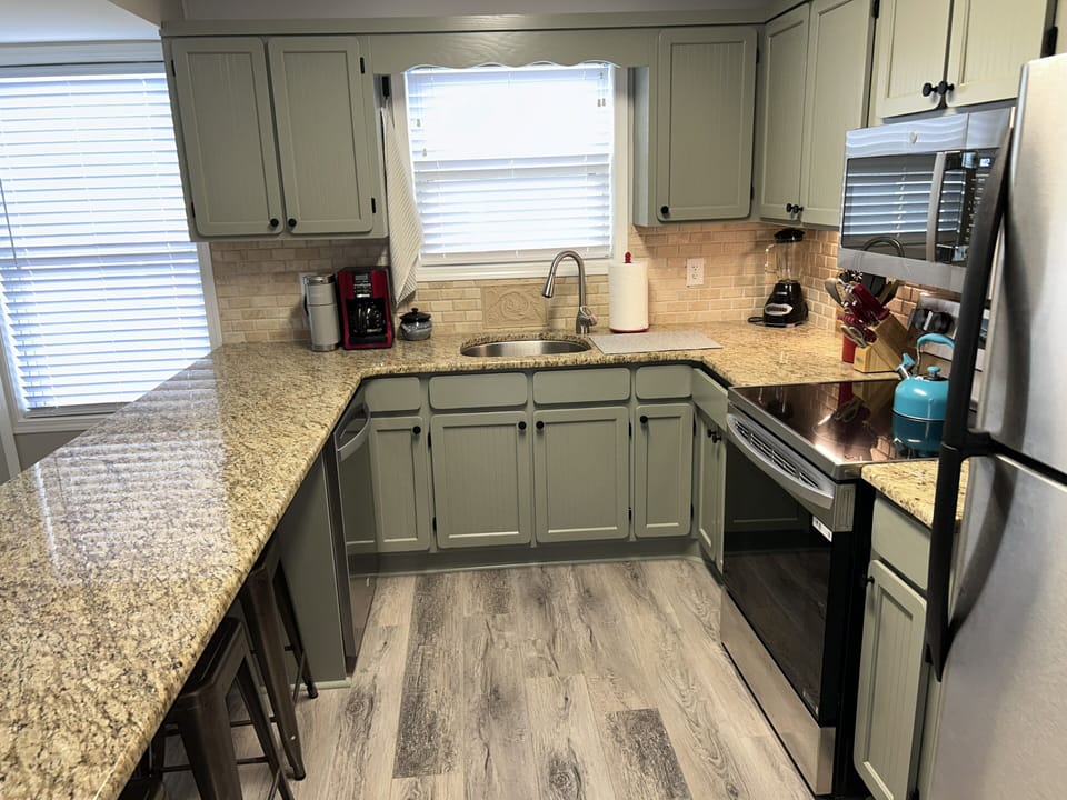Fully updated kitchen with new flooring and stainless appliances!