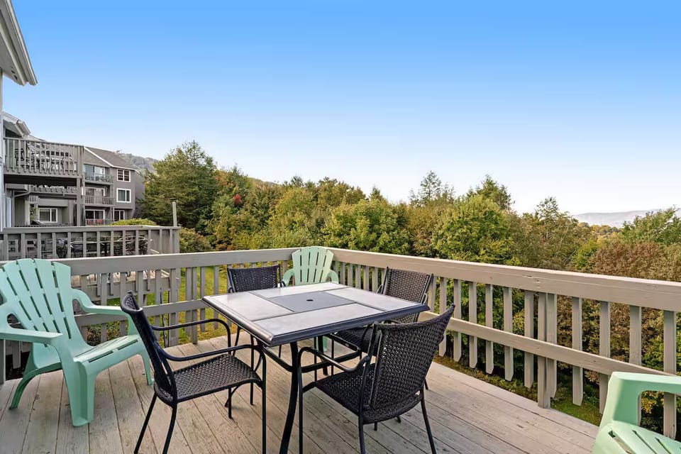 Private deck with breathtaking treetop and valley views for morning coffee.