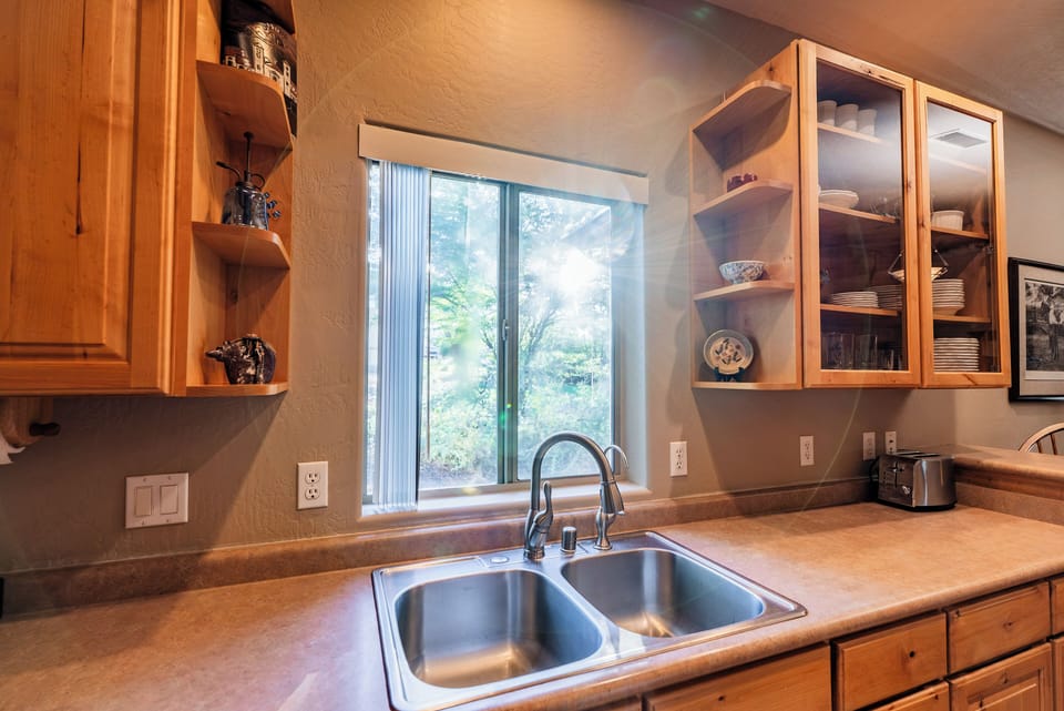Kitchen window view is peaceful and relaxing.