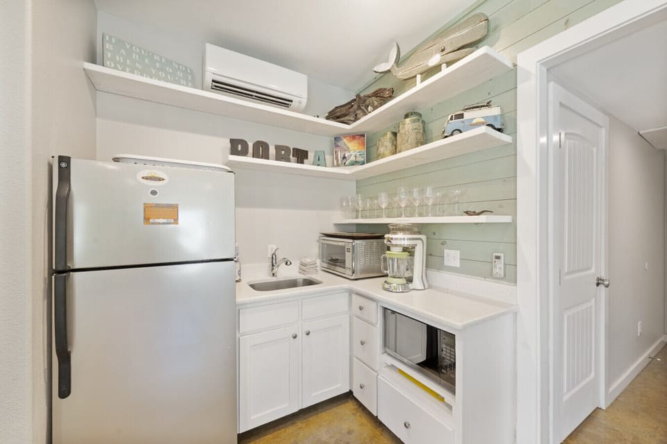 Bright, well-stocked kitchen with fun Port A touches