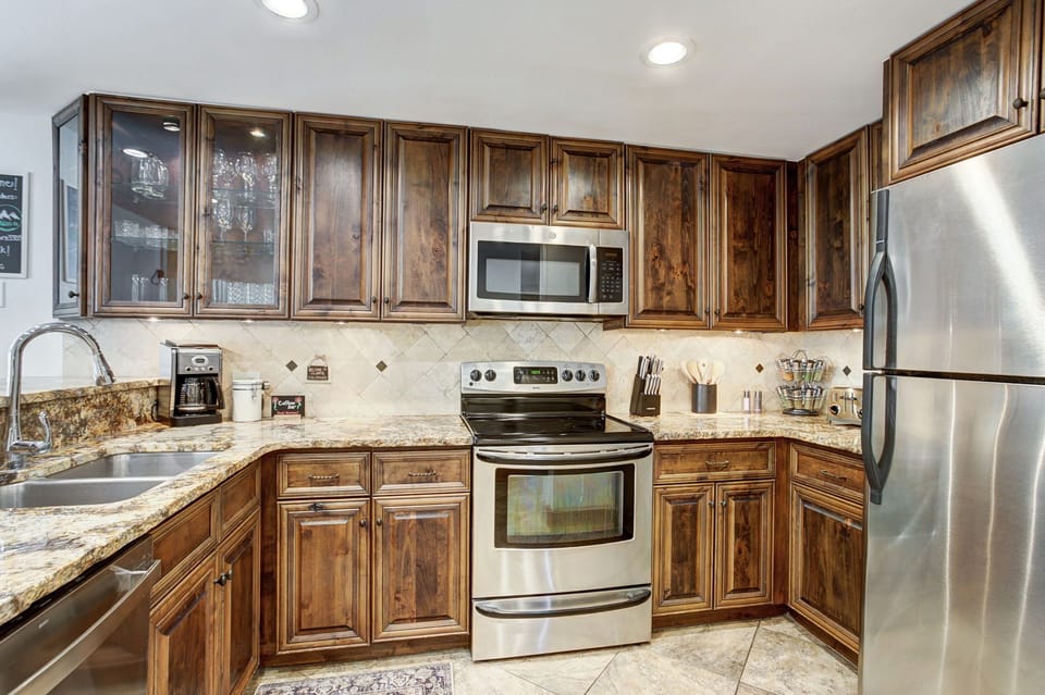 Kitchen with all major appliances.