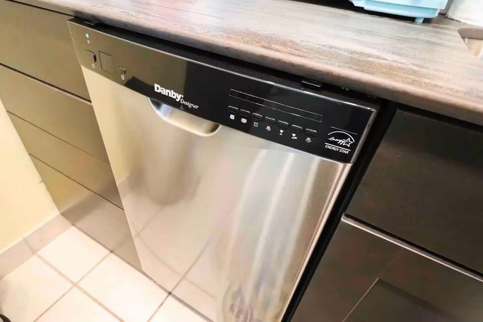Modern stainless steel dishwasher with easy controls and energy efficient design