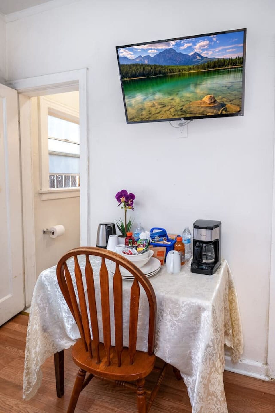 This fully furnished studio includes a private work desk, high-speed Wi-Fi, Smart TV for streaming, refrigerator, microwave, window air conditioning, ceiling fan, blackout curtains, complimentary snacks, and additional essentials to ensure a comfortable a