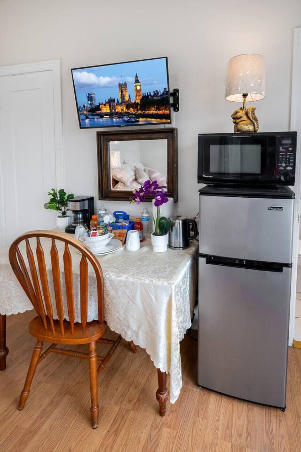This fully furnished studio includes a private work desk, high-speed Wi-Fi, Smart TV for streaming, refrigerator, microwave, window air conditioning, ceiling fan, blackout curtains, complimentary snacks, and additional essentials to ensure a comfortable a