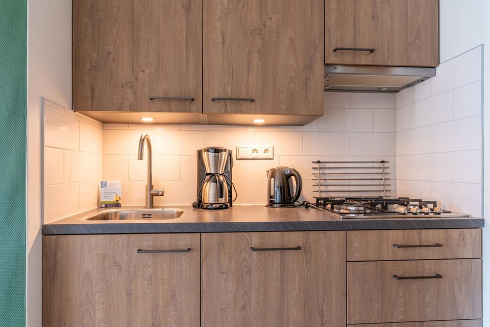 Apartment | Private kitchen | Highchair, cookware/dishes/utensils