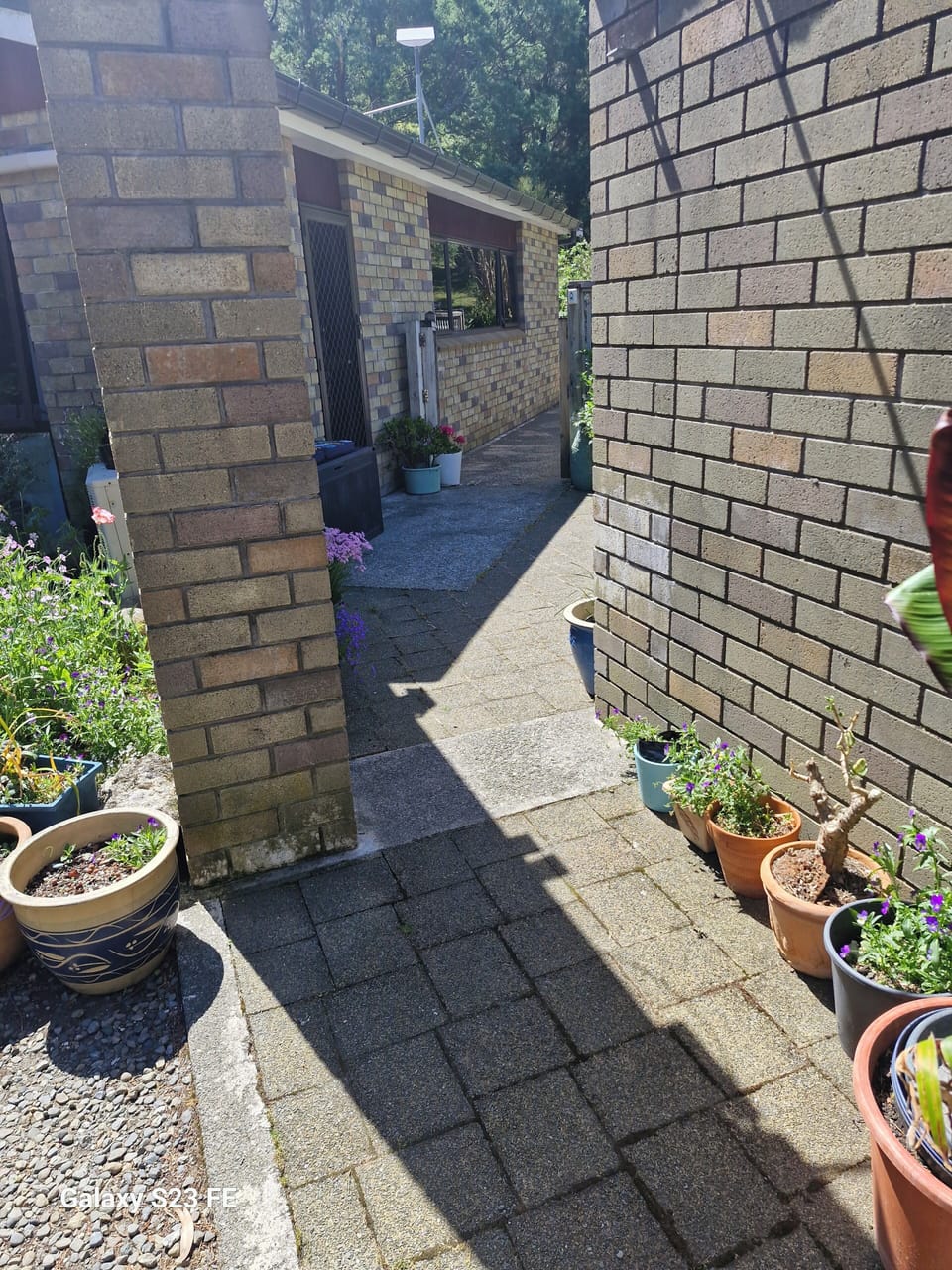 Walk through opening to front door.