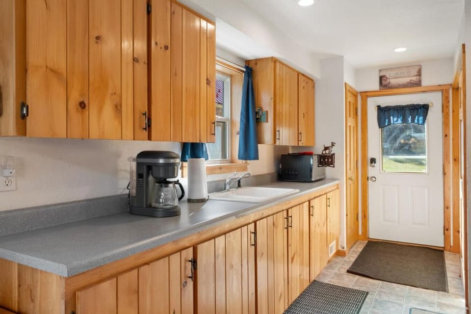 Fully Equipped Kitchen | Wood Cabinets, Modern Appliances & Forest Views