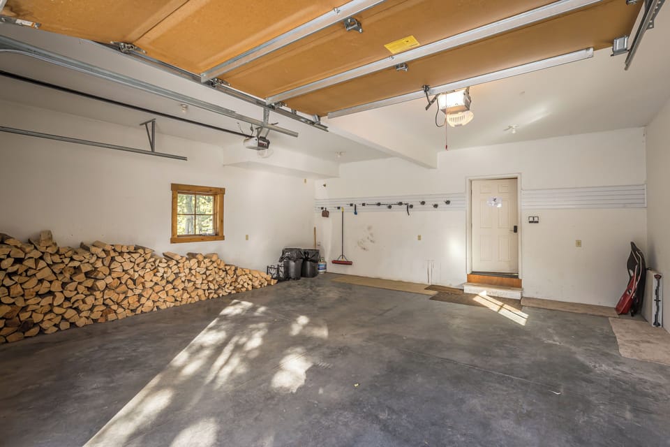Two-stall garage with an area to hang your skis up!