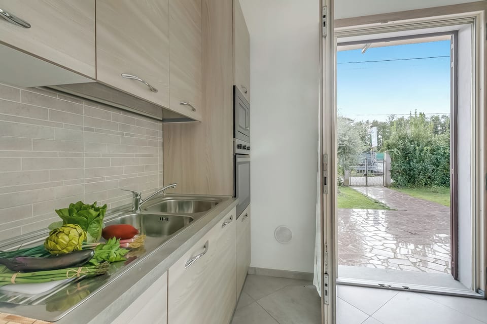 Family House, Multiple Bedrooms, Refrigerator & Microwave (Casa Nadia 1.2 Km from Sea/Near) | Private kitchen | Fridge, microwave, oven, stovetop