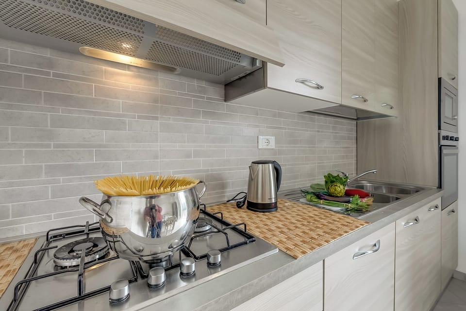 Family House, Multiple Bedrooms, Refrigerator & Microwave (Casa Nadia 1.2 Km from Sea/Near) | Private kitchen | Fridge, microwave, oven, stovetop