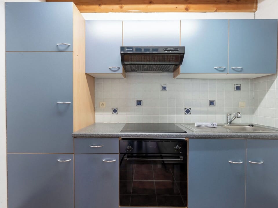 Kitchen, Countertop, Kitchen Appliance, Kitchen Sink, Cabinetry, Major Appliance, Flooring, Interior Design, Sink, Plumbing Fixture