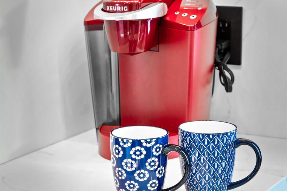 Vacation fuel? Brewed and ready. Whether you’re an early riser or a “don’t talk to me until my second cup” type, this coffee station’s got your back.
