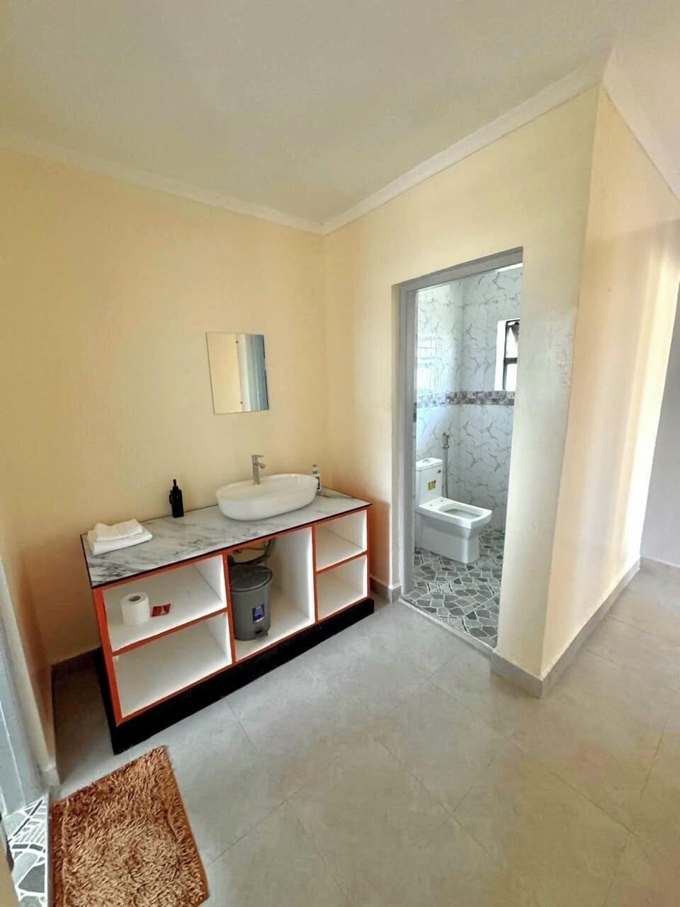 Double or Twin Room, Garden View | Bathroom | Shower, slippers, towels, soap