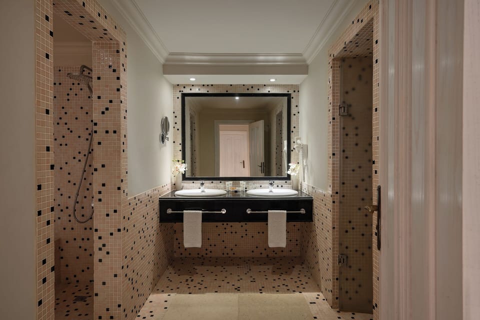 Separate tub and shower, hair dryer, slippers, bidet