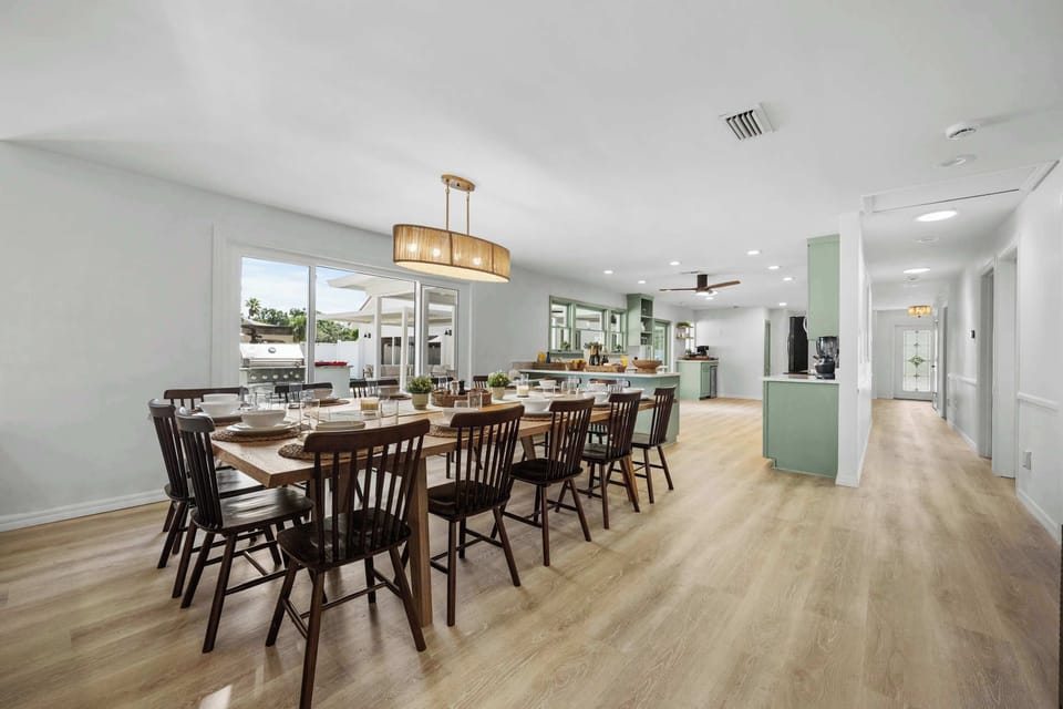 Open-concept dining and kitchen with natural light throughout