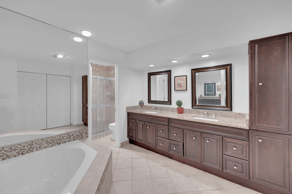 Master bathroom with bathtub