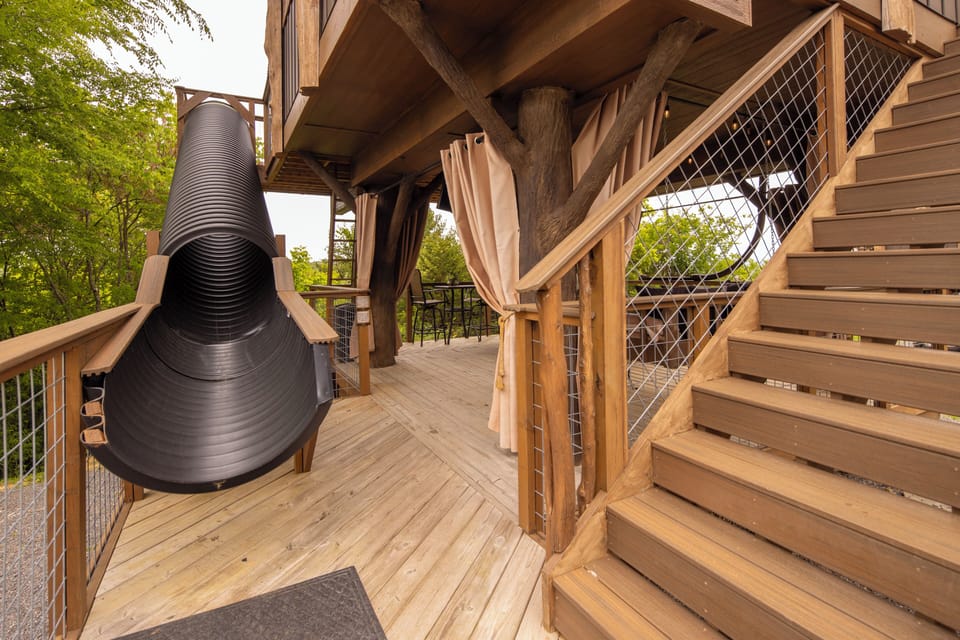 20-FOOT SLIDE AT TREE-T-MENT CENTER LUXE TREEHOUSE - SANCTUARY TREEHOUSE RESORT - NOT YOUR ORDINARY ACCOMMODATION