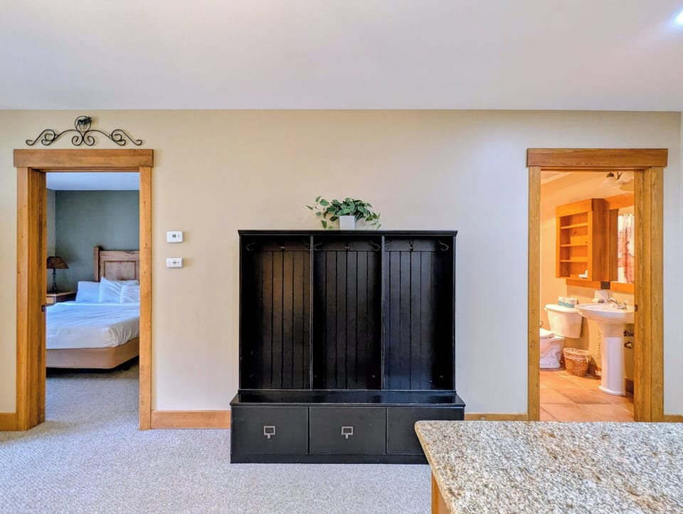 Coat rack with storage in entry way