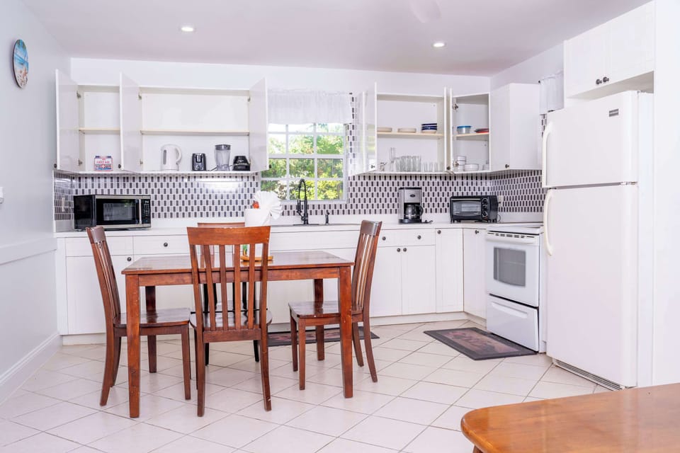 Whip up delicious meals in our bright, fully equipped kitchen.