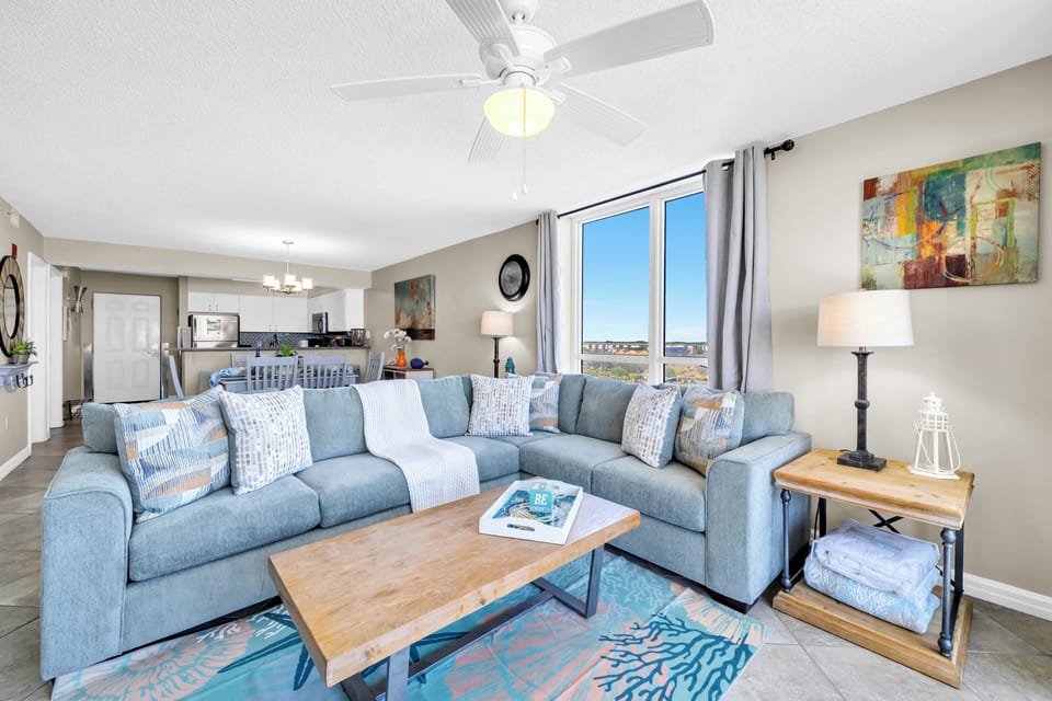 Sink into this spacious sectional and let the coastal breeze from your ceiling fan cool you as you unwind after beach days.
