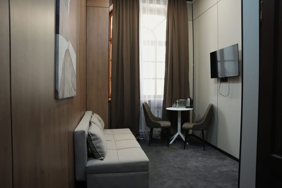 Family Room | In-room safe, desk, laptop workspace, iron/ironing board