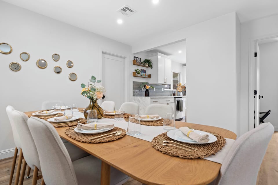 Dining area next to kitchen with door to garage in between.