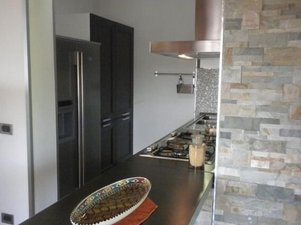 Suite, Jetted Tub | Private kitchen | Full-size fridge, stovetop, coffee/tea maker, cookware/dishes/utensils