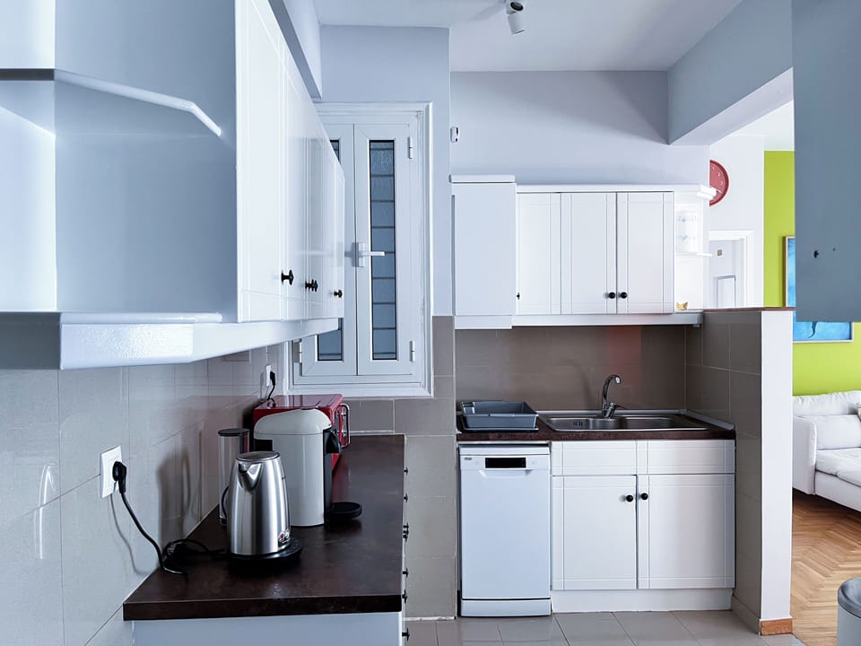 In the kitchen cabinets, you’ll find all the essentials for meal preparation.