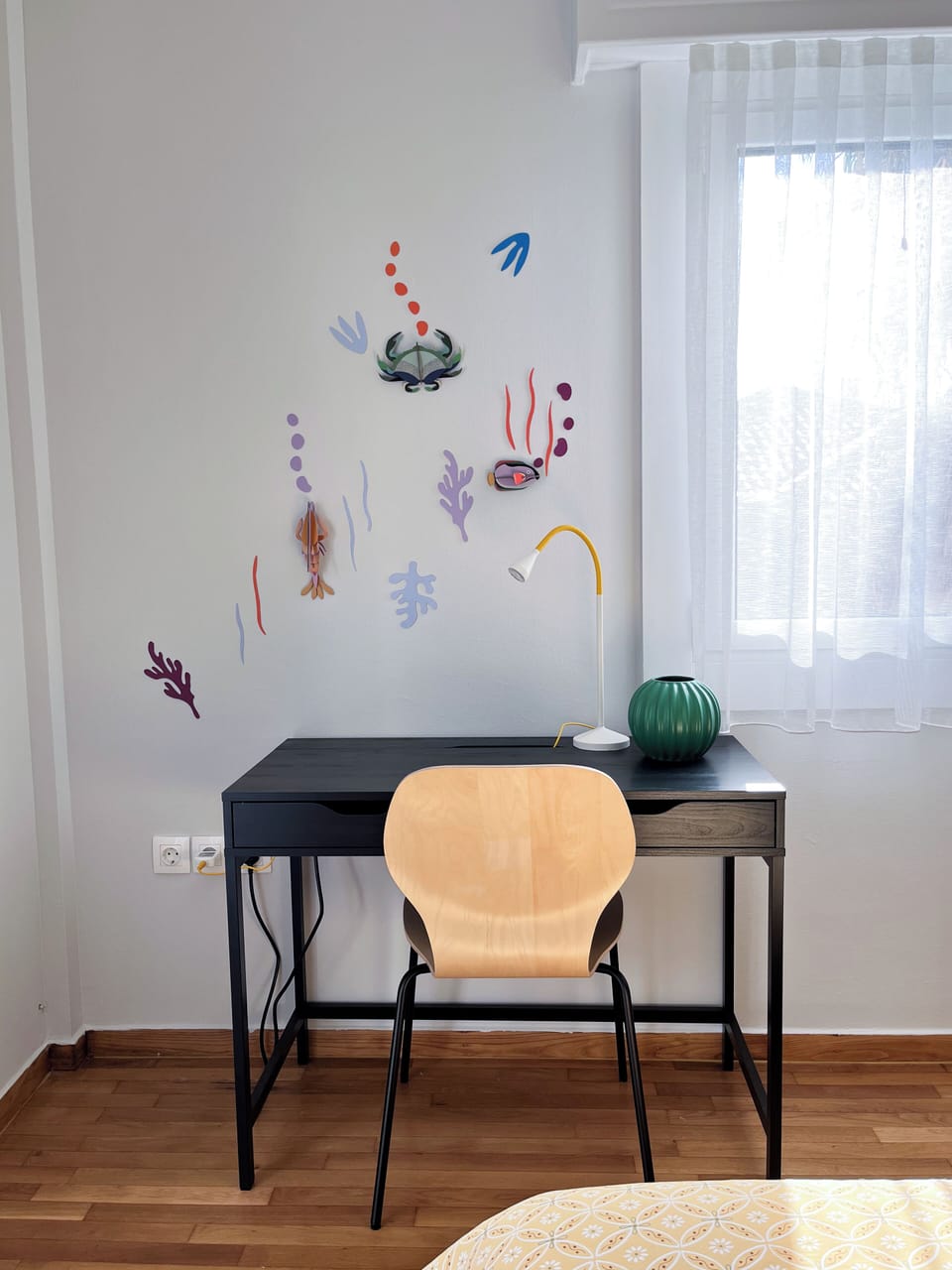 We have created a comfortable workspace with a desk, an adjustable lamp.