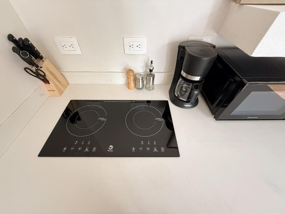 Standard Apartment, Garden View | Private kitchen | Microwave, stovetop, cookware/dishes/utensils