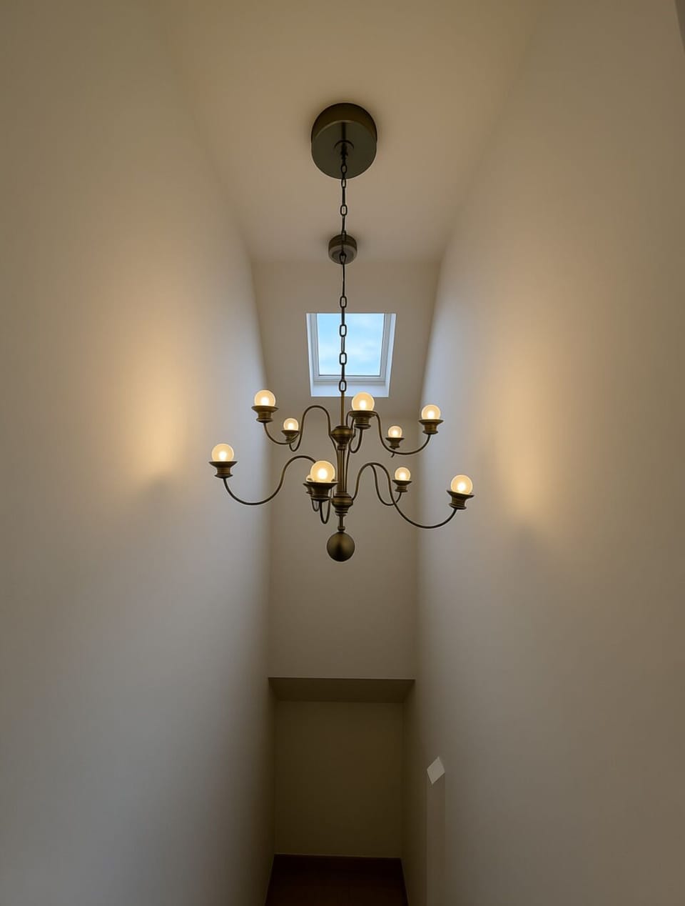 Unique lighting features and a skylight add a touch of modern design to the home