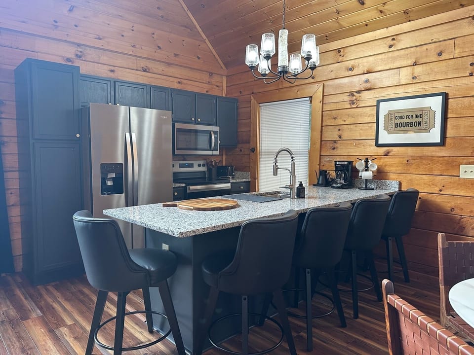 This is the gathering place while making dinner or enjoying conversation with family and friends. The comfortable counter stools will make you want to hang out for hours.