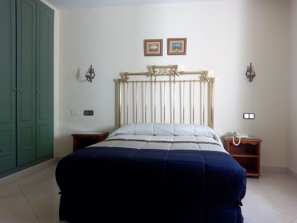 Double or Twin Room | Desk, blackout drapes, rollaway beds, free WiFi
