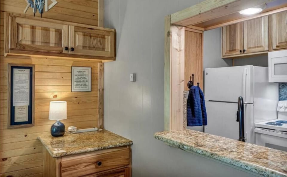 Thoughtful touches and warm lighting create a cozy lakehouse feel.