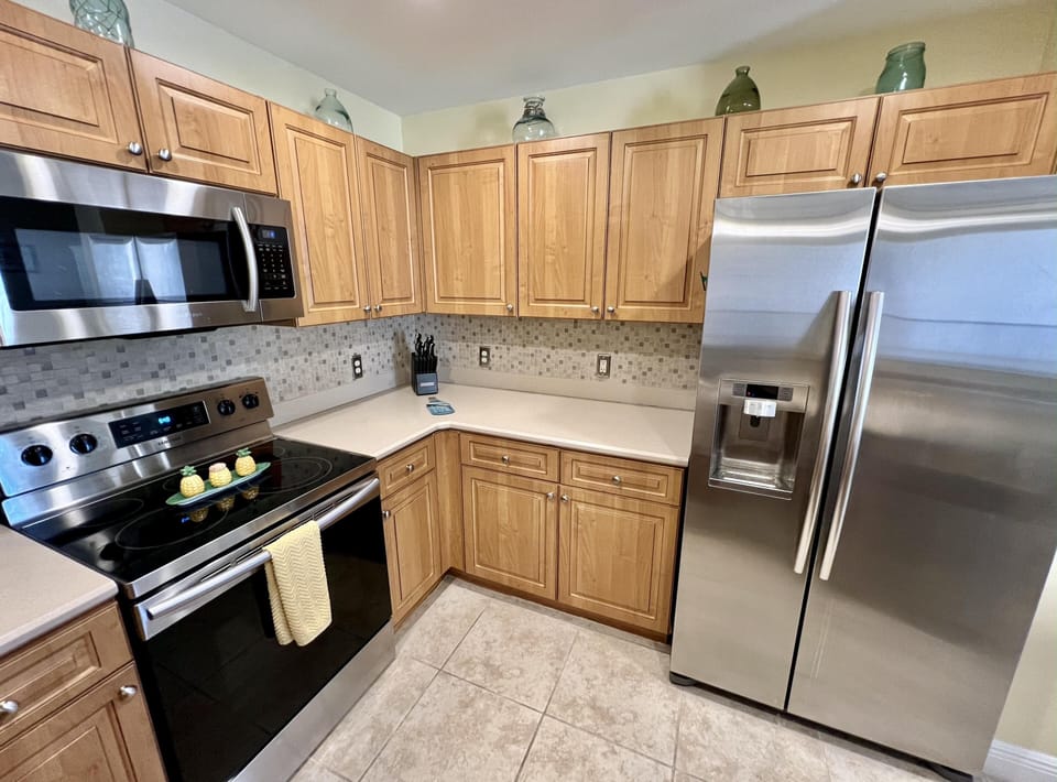 Modern kitchen with stainless steel appliances and ample storage