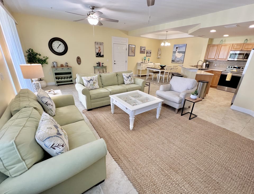 Spacious living room with cozy seating and open kitchen flow