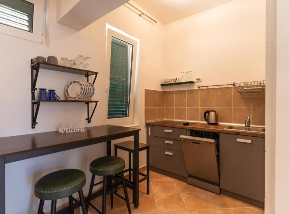 Apartment (Apartment Verde Blu - Two Bedroom Apa) | Private kitchen | Fridge