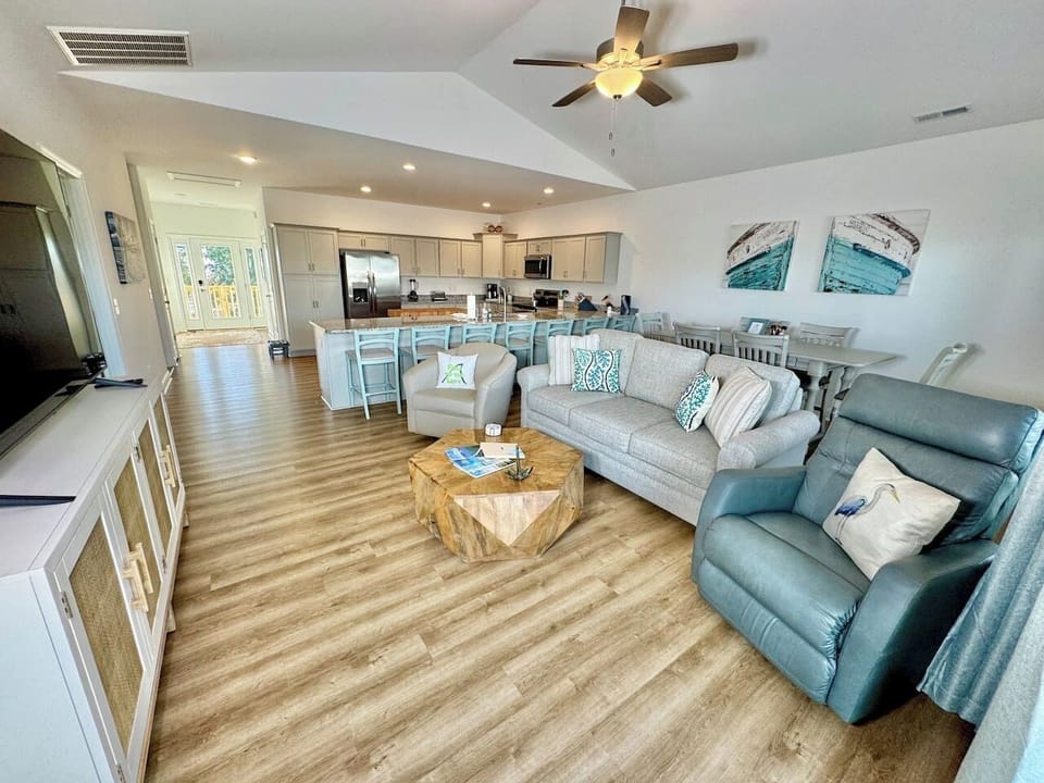 Get cozy while you relax in this living room with a water view. Sofa bed features a Queen mattress. 