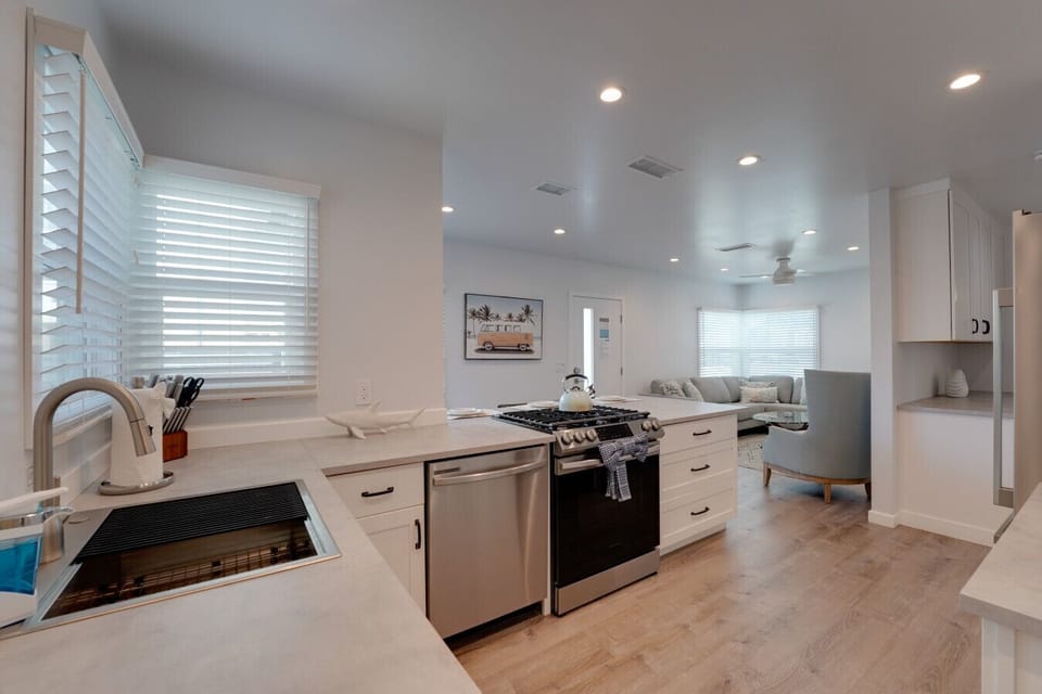 The kitchen has full size stainless steel appliances